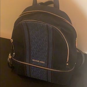 Michael Kors blue jean backpack purse